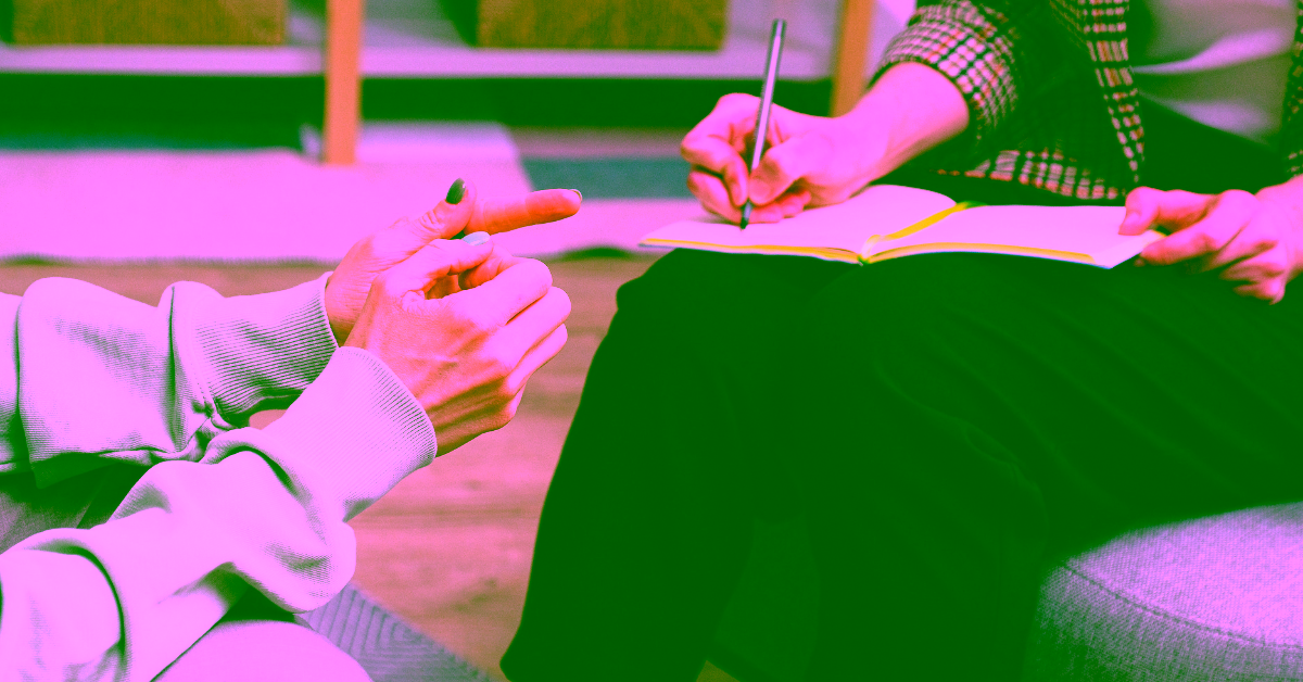 A woman in therapy with her addiction treatment therapist using evidence-based addiction treatment methods