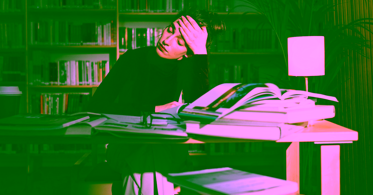 A college student or professional woman struggling with productivity pills