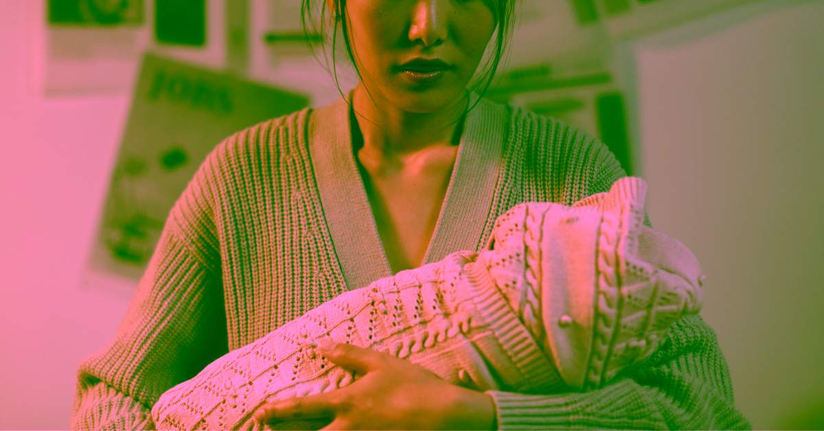 A mother with her newborn experiencing postpartum psychosis